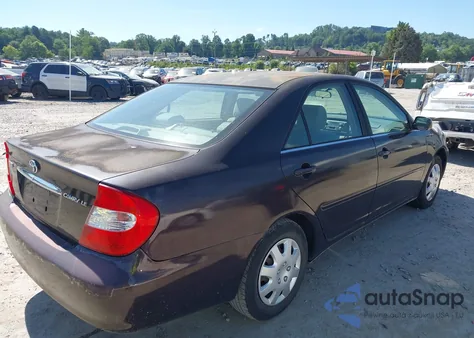 2002 Toyota Camry Le из США, поврежденный, VIN JTDBE32K720069121